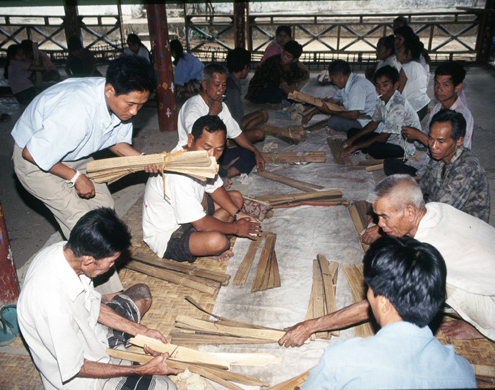 Sorting manuscripts, Luang Prabang